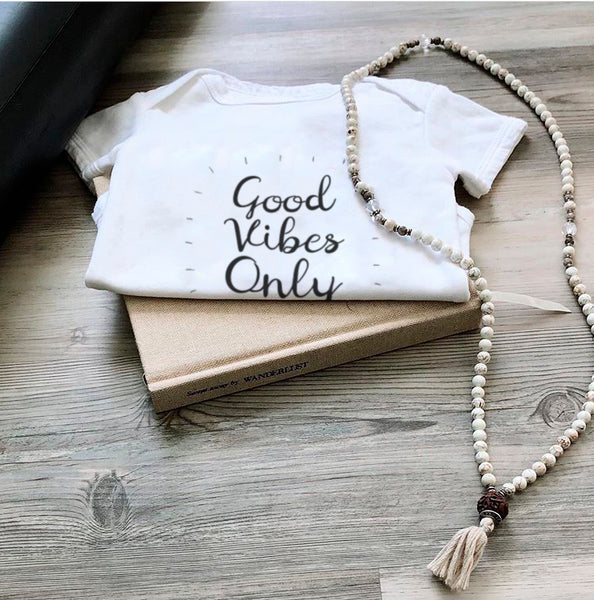 Yoga baby, organic cotton girl boy, good vibes only onesies for babies. Certified organic cotton baby onesie. Baby yoga bodysuit ethically made soft cotton. No latex, skin-friendly. Toddler skin healthy. non-toxic, eco-friendly yoga onesies for babies made with minimal wastage. Good vibe romper, babies enjoy yoga. Comfy. Made to last. Gift for babies. Unisex gender-neutral bodysuit, baby shower gift. Unisex onesie 3, 6, 12 months yoga onesies. White bodies baby clothes. one piece